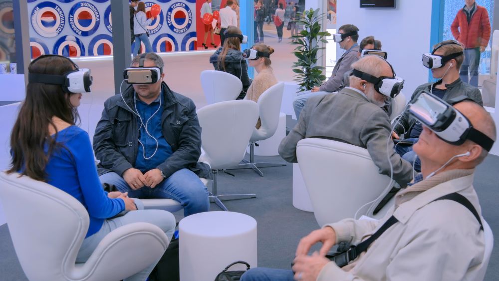People Engaging with VR at an Event Photo Credit: Zyabich1 / Shutterstock.com