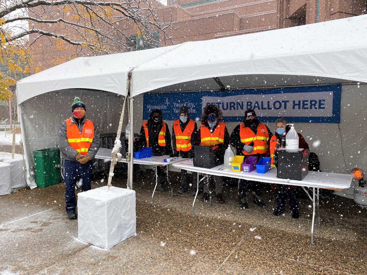 Voters in Minneapolis can walk, bike or drive up to the Minneapolis Convention Center to return their mail ballots.