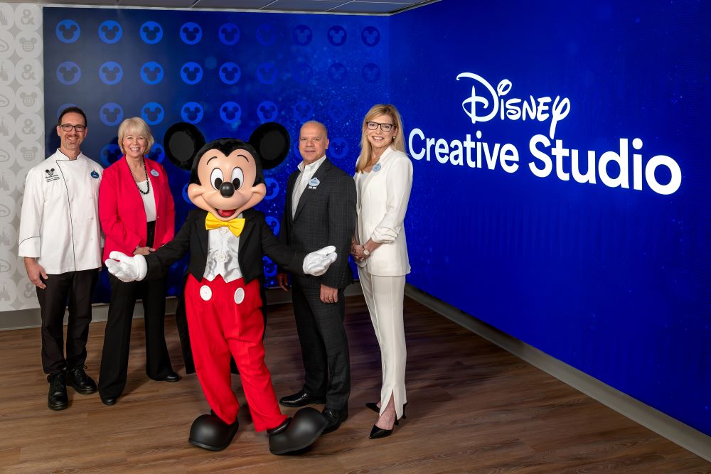 Left to right: Anthony De Luca, culinary director of Disney Catered Events; Amy Pfeiffer, director of Disney Meetings & Events; Mickey Mouse; Ramiro Vazquez, vice president of Walt Disney World Gatherings; and Cindy Garber, director of Disney Event Group