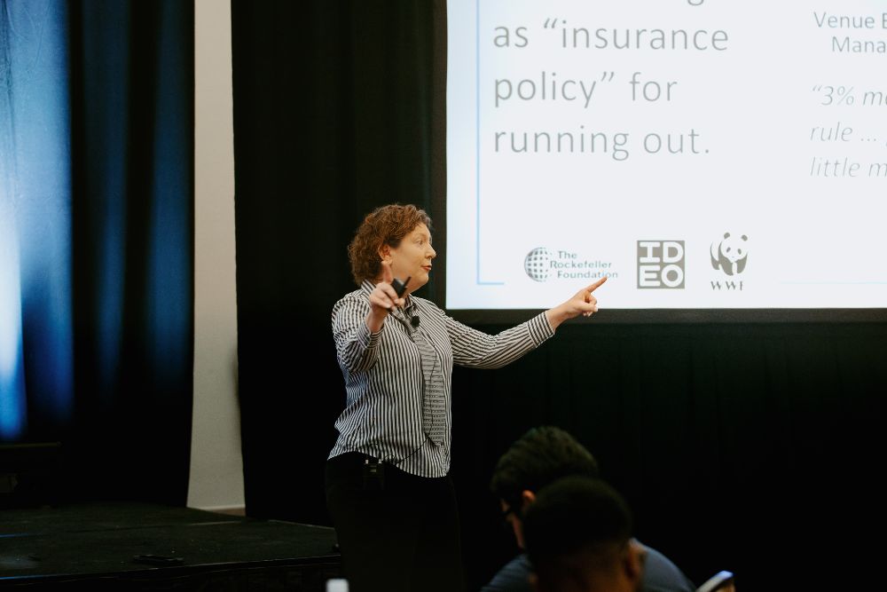 MPI's Jessie States gives her keynote address. Credit: Wandering Maverick Photo+Film