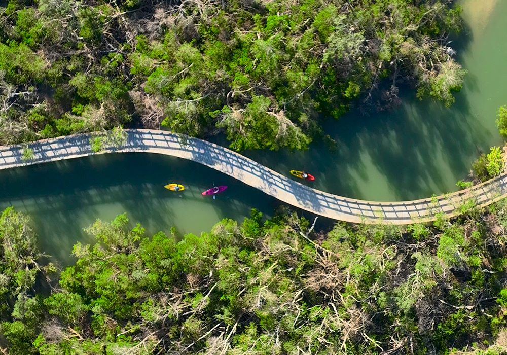 Teams kayak through Robinson Preserve, one of the many nature parks and preserves in the area.