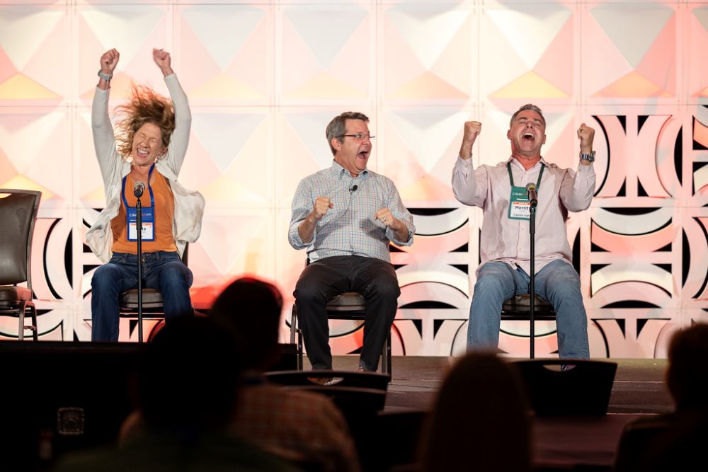 Joel Zeff playing an improv game with audience members