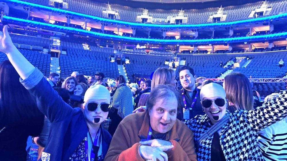 Meetings Today V.P. and Chief Content Director Tyler Davidson hamming it up with two Pitbull impersonators at the closing night concert.