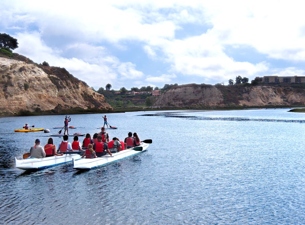 Photo of Outrigger canoe and SUP paddling in Newport's Back Bay.