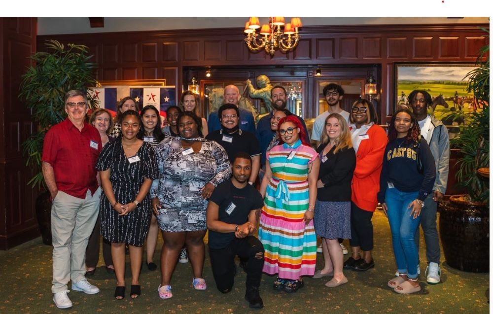 Group photo of Alumni Clyde’s Event, American Experience Foundation.