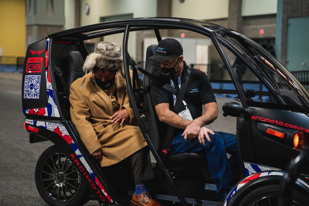 Photo of student at Washington, D.C. Auto Show.