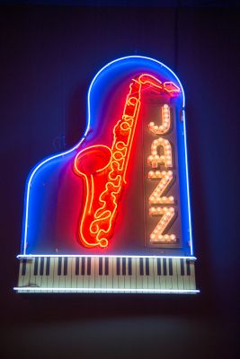 Neon sign reads "Jazz" with a trumpet and piano outside the American Jazz Museum in Kansas City