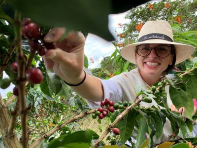Ashley Lawson picking coffee beans in Colombia's coffee country