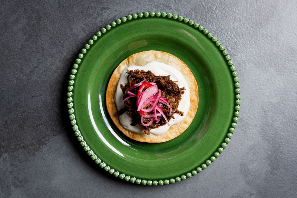 Short Rib Tostadas on a green plate