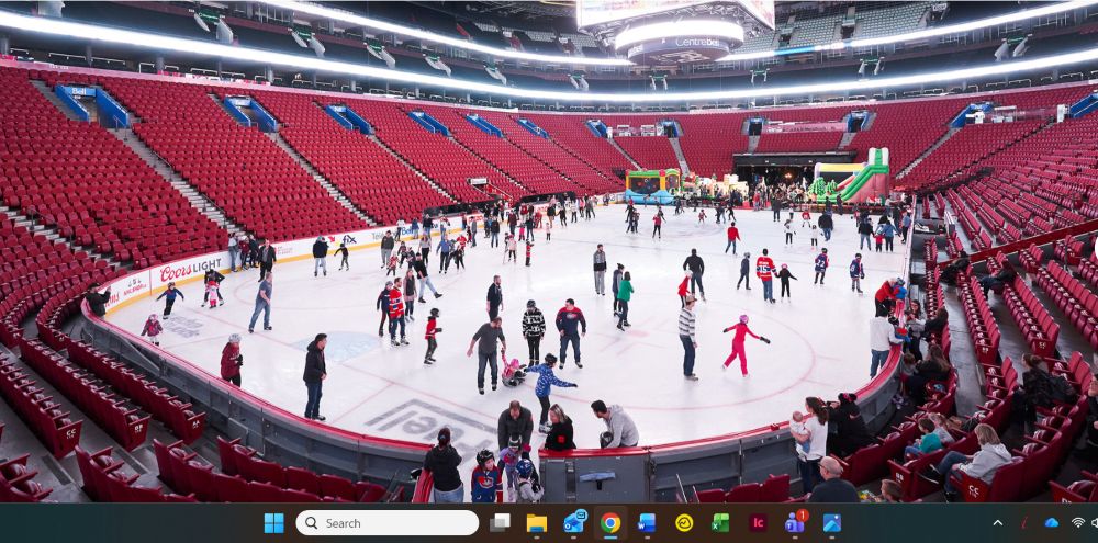 Bell Centre, with people skating on the ice.