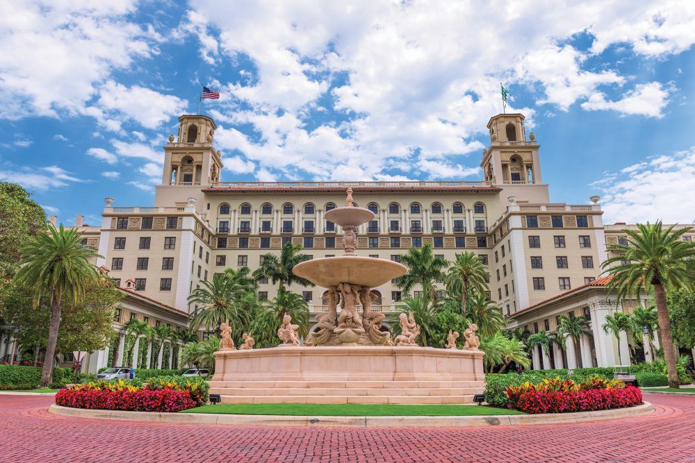 Breakers Palm Beach exterior with fountain in the foreground.