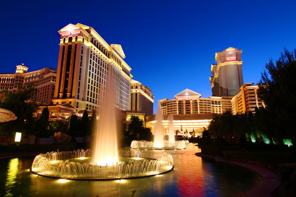 Caesars Palace with fountains in the foreground.