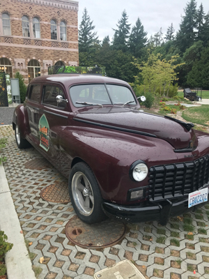 Photo of vintage car outside of The Lodge at St. Edward Park.