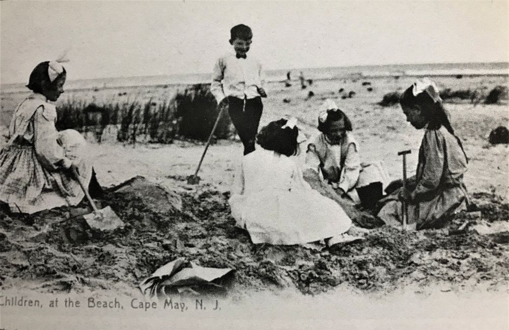 Children on the beach in Cape May, vintage black and white photo.