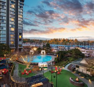 Courtyard of Westin Bayshore, with pool and harbor in the distance.
