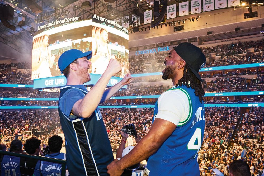 Fans enjoy Dallas Mavericks game at American Airlines Center. 