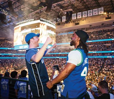 Fans enjoy Dallas Mavericks game at American Airlines Center. 