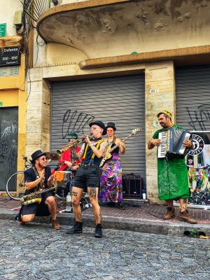 Visiting a Sunday market in Buenos Aires, Argentina and enjoying music from a local band called Felices Pastores (was sure to ask permission & share a tip after dancing along!)