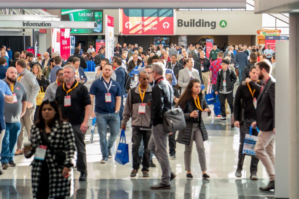 Photo of convention attendees walking in the Georgia World Congress Center.