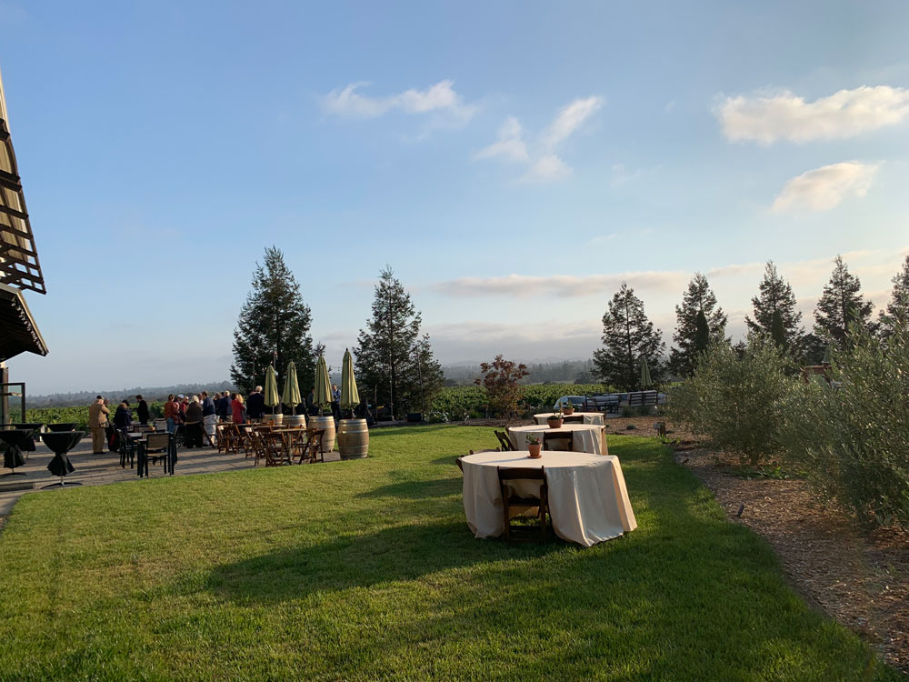 Photo of Balletto Vineyards garden with tables.