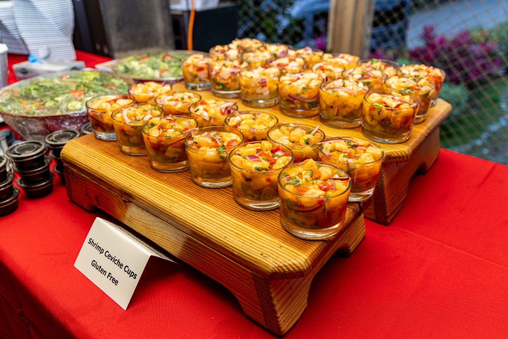 Photo of gluten-free shrimp ceviche cups on a serving table.