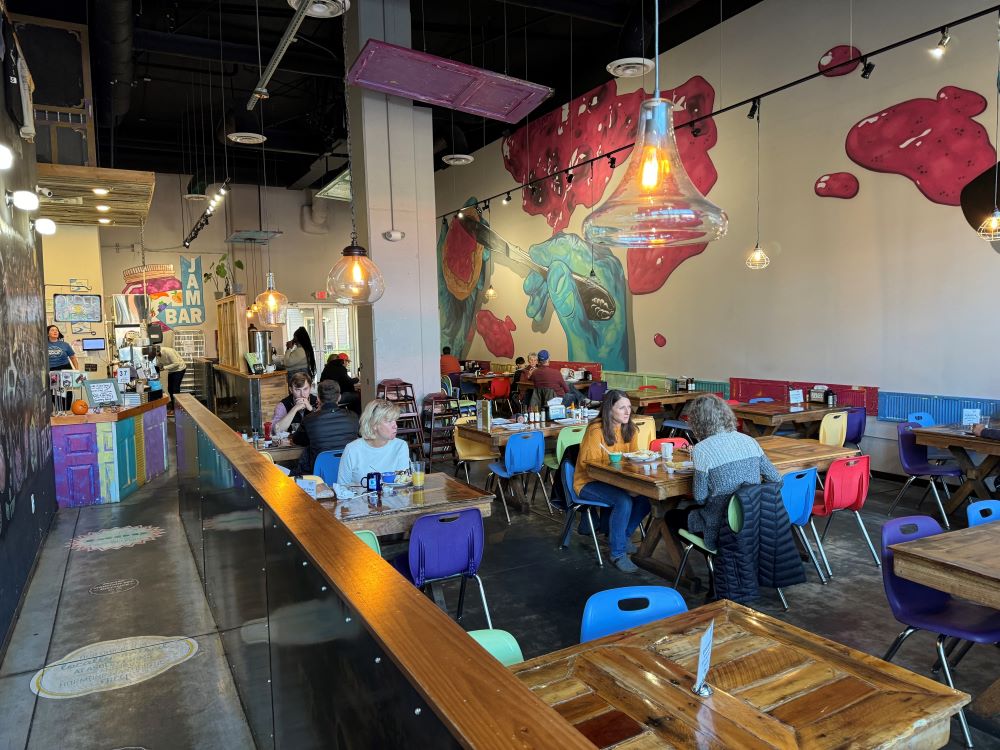 Photo of people dining at Biscuit Head restaurant in Greenville, South Carolina.