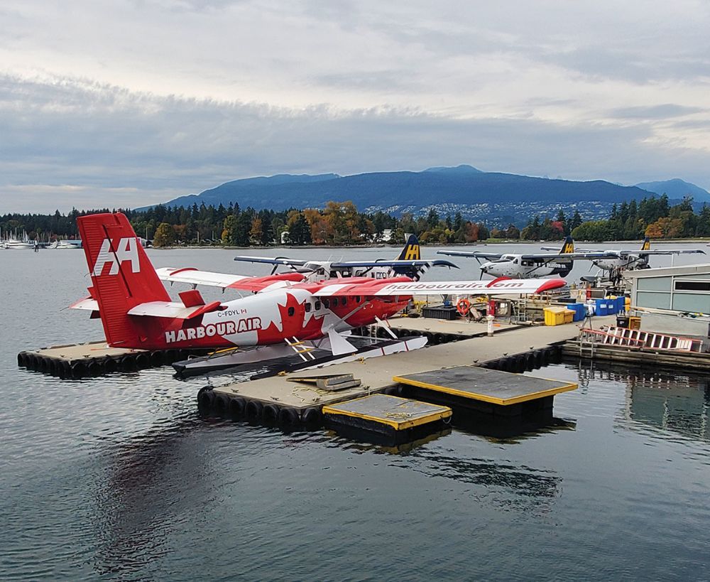 Harbour Air seaplane base, with a seaplane moored to a dock.