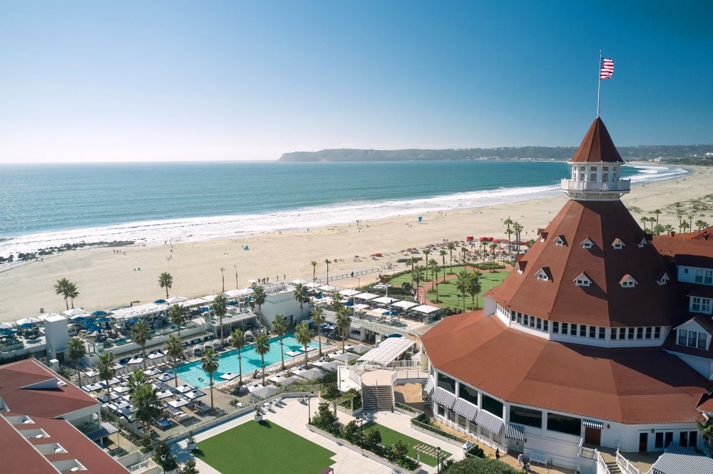Photo of Hotel del Coronado, with the beach in the background.