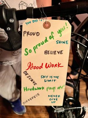 Impact 4 Good tag with affirmations printed on it.