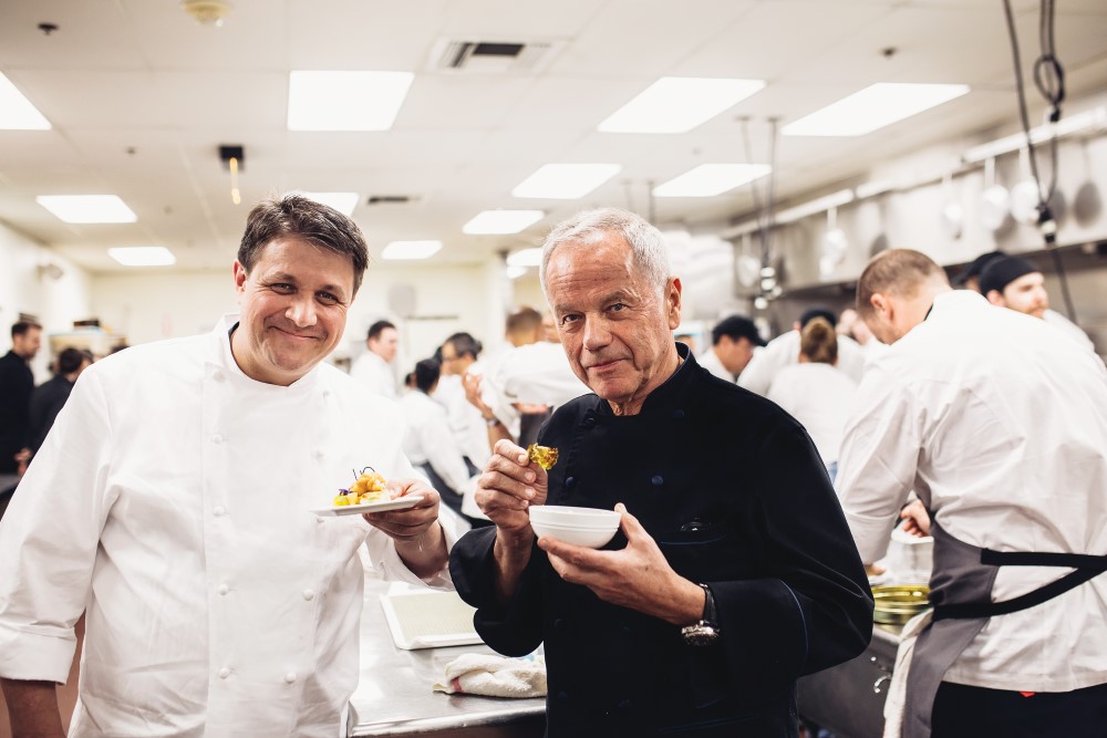 Photo of Wolfgang Puck and Vice President of Culinary Eric Klein at Oscars Governors Ball.