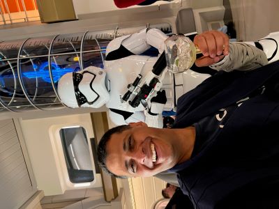 Jonathan Alder poses with a Stormtrooper at a Star Wars-themed Disney event