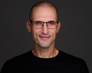 Julius Solaris in a black tshirt.