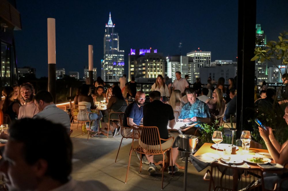 Nighttime photo of rooftop restaurant at La Terrazza.