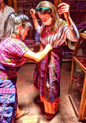Lake Atitlan, Guatemala, Trying on Dress from Local Women's Weaving Co-Op.