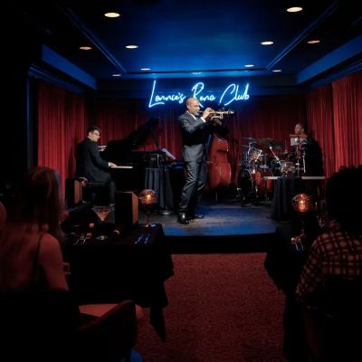 Lonnie McFadden plays the trumpet on stage at Lonnie's Reno Club