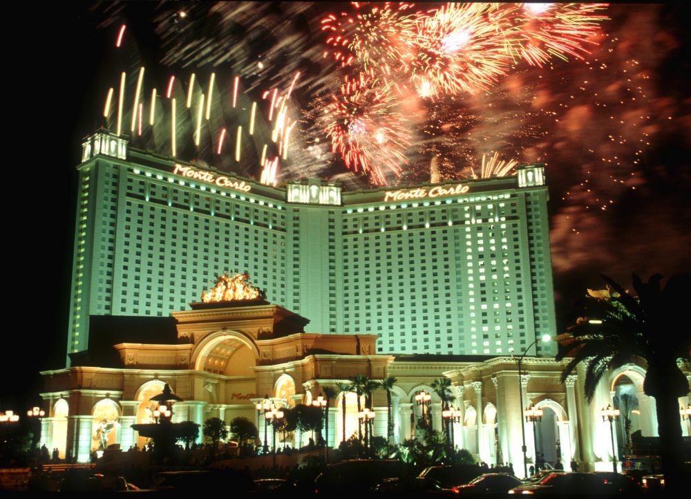 Opening on Monte Carlo resort in Las Vegas, with fireworks in the background.