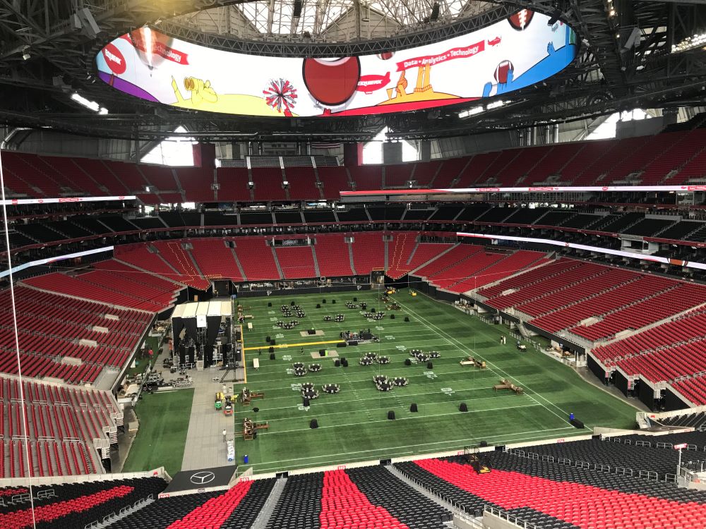 Photo of Atlanta's Mercedes-Benz Stadium set up for ASAE Annual Meeting & Exposition opening night event.