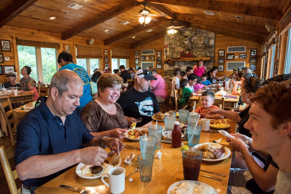 People eating at a table at Neal's Dining Room.