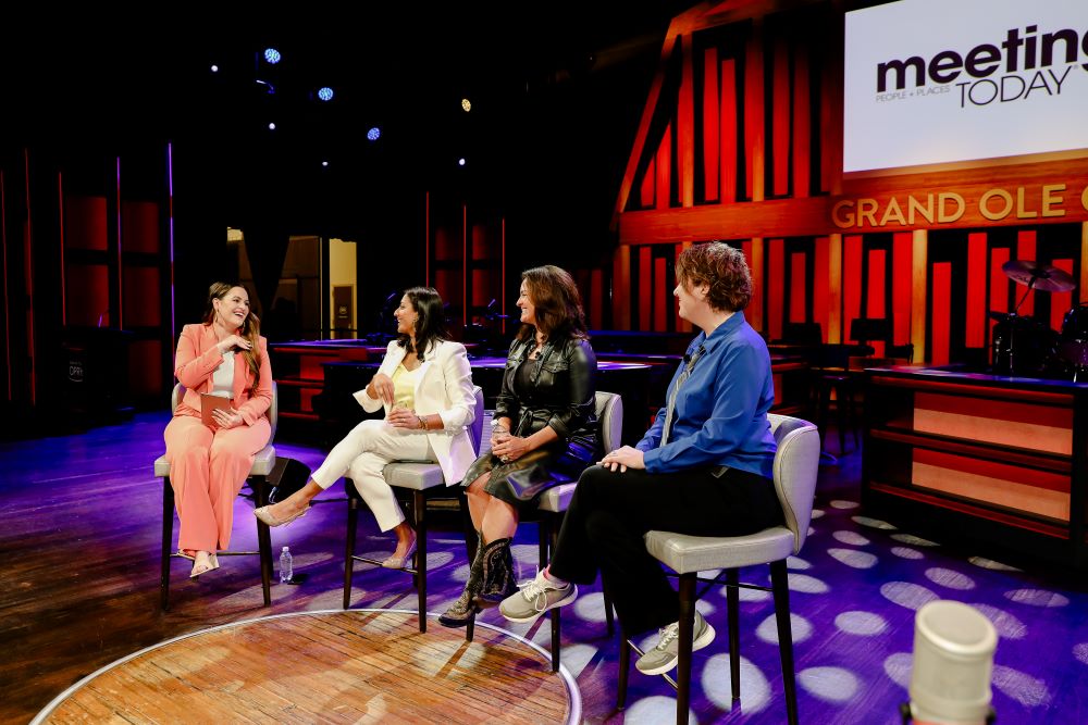 Photo of Dare to Interrupt hosts and panelists at the Grand Ole Opry.