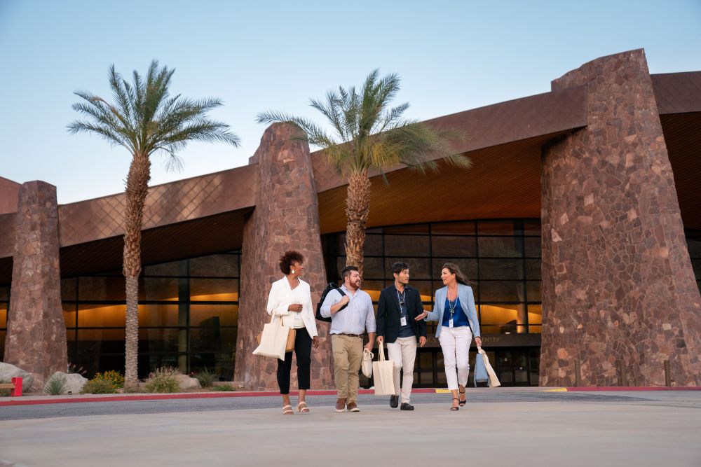 Guests leave Palm Springs Convention Center.