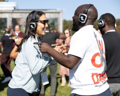 Participants dance together at a Be You Disco event