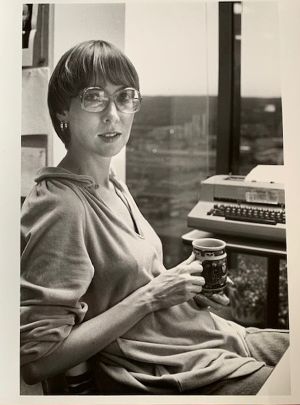 Vintage phot of Patricia Sharpe at her typewriter in the 1970s.
