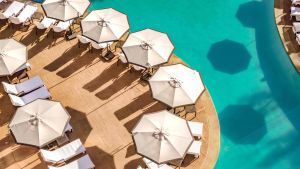 Image of the pool area at The Ritz-Carlton Dallas, Las Colinas.