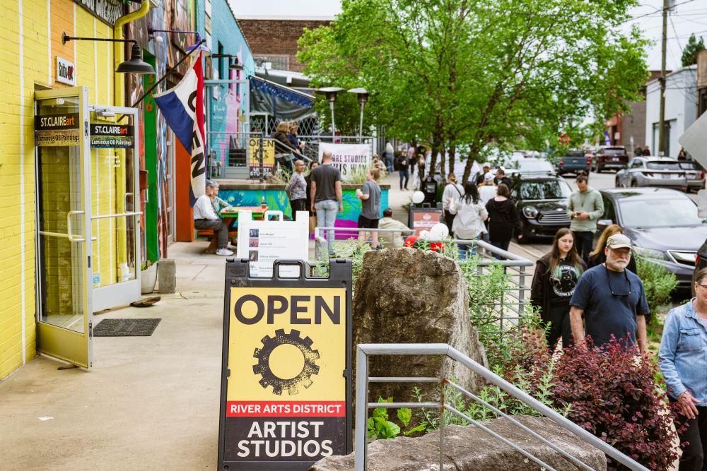 Photo of River Arts District with Artist Studios sign on the street.