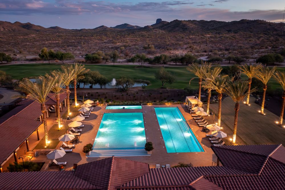 Rancho de los Caballeros Resort pool complex at night