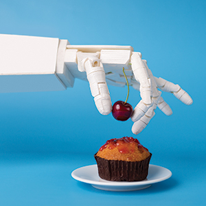 Graphic of robot putting a cherry on a cupcake.