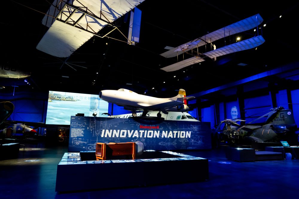 Image of a jet on top of an exhibit that is titled Innovation Nation at Sullenberger Aviation Museum.