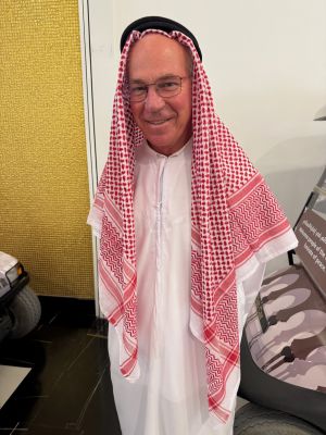Photo of Scott McKibben in traditional arab clothing.