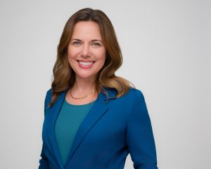 Sherri Stauder in a blue blazer and shirt.