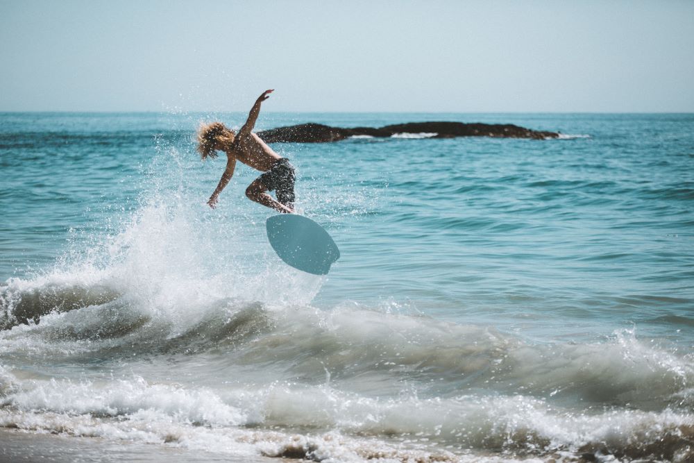 Skimboarding in Laguna Beach, California